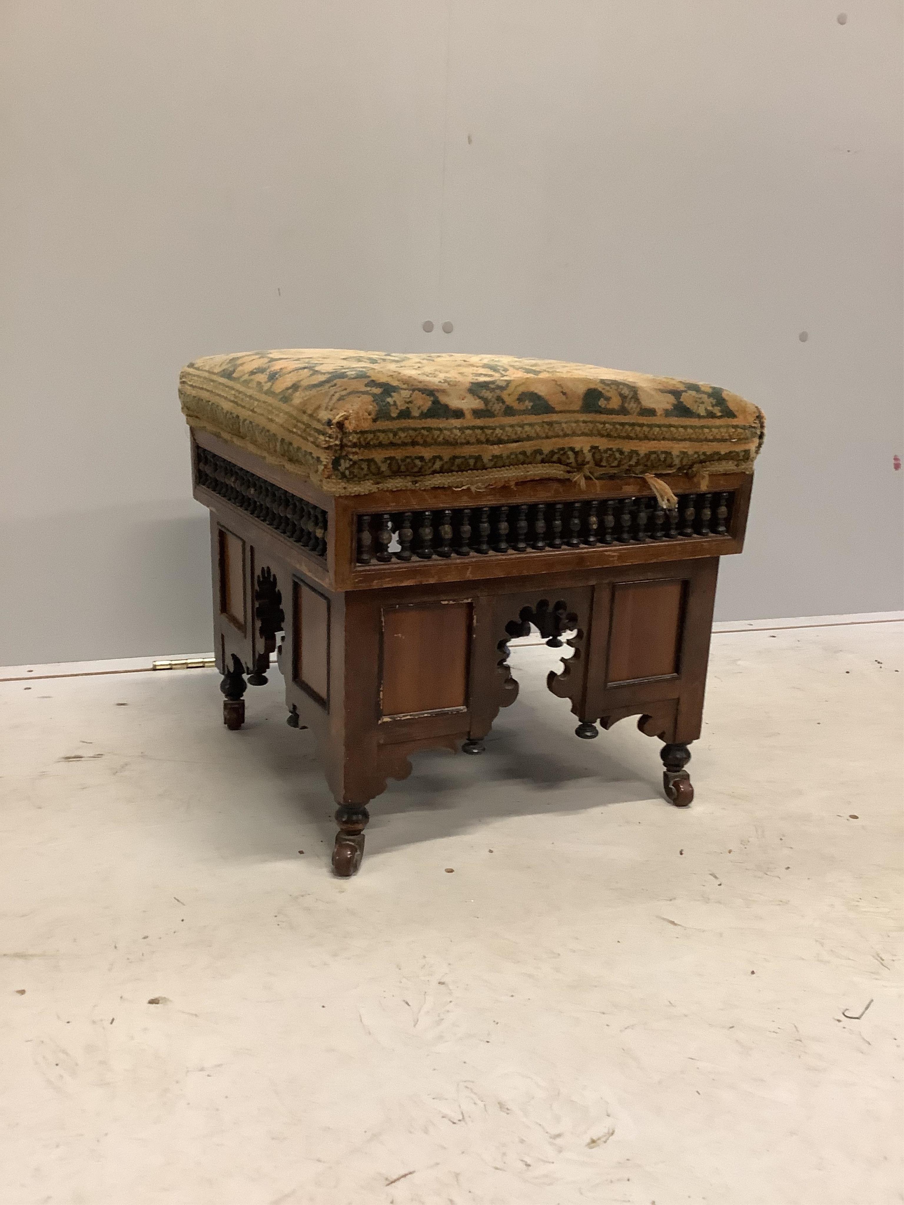 A Moorish style dressing stool in the manner of Liberty & Co, width 44cm, depth 44cm, height 41cm. Condition - fair